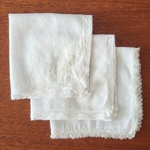 3 lace-bordered white handkerchiefs